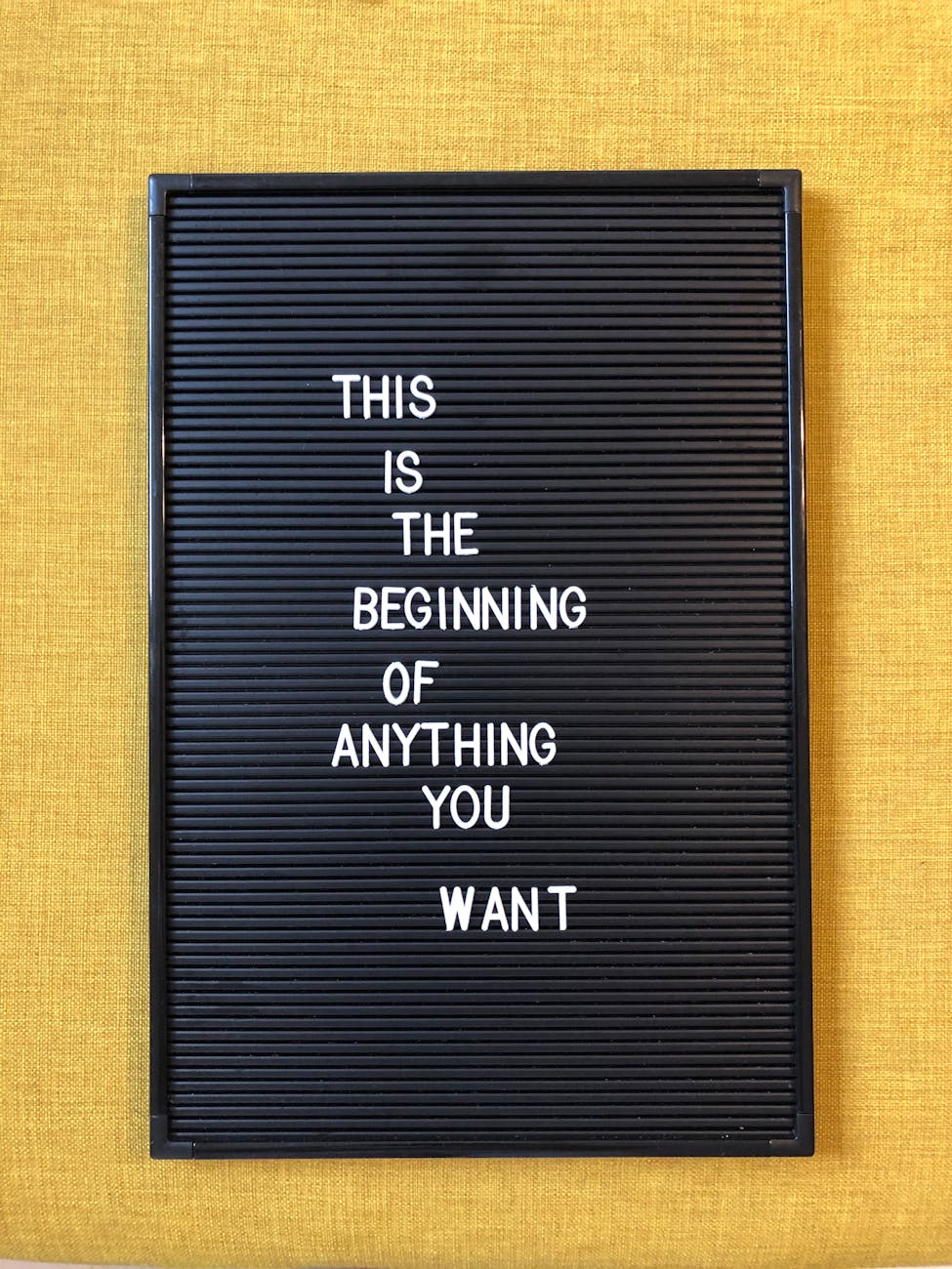 inspirational quote on black letter board