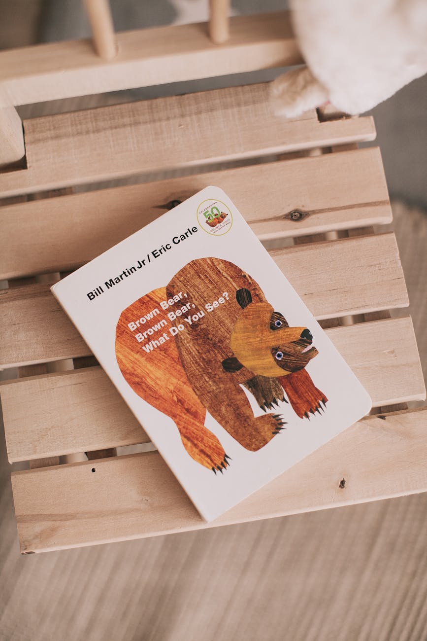 white book on wooden chair